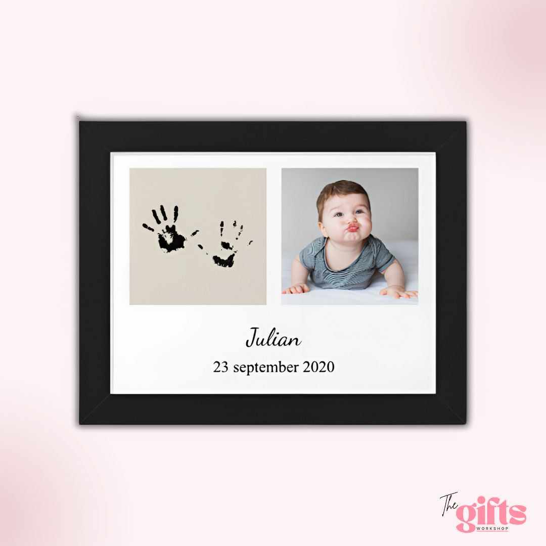 Framed picture with handprints and baby Julian