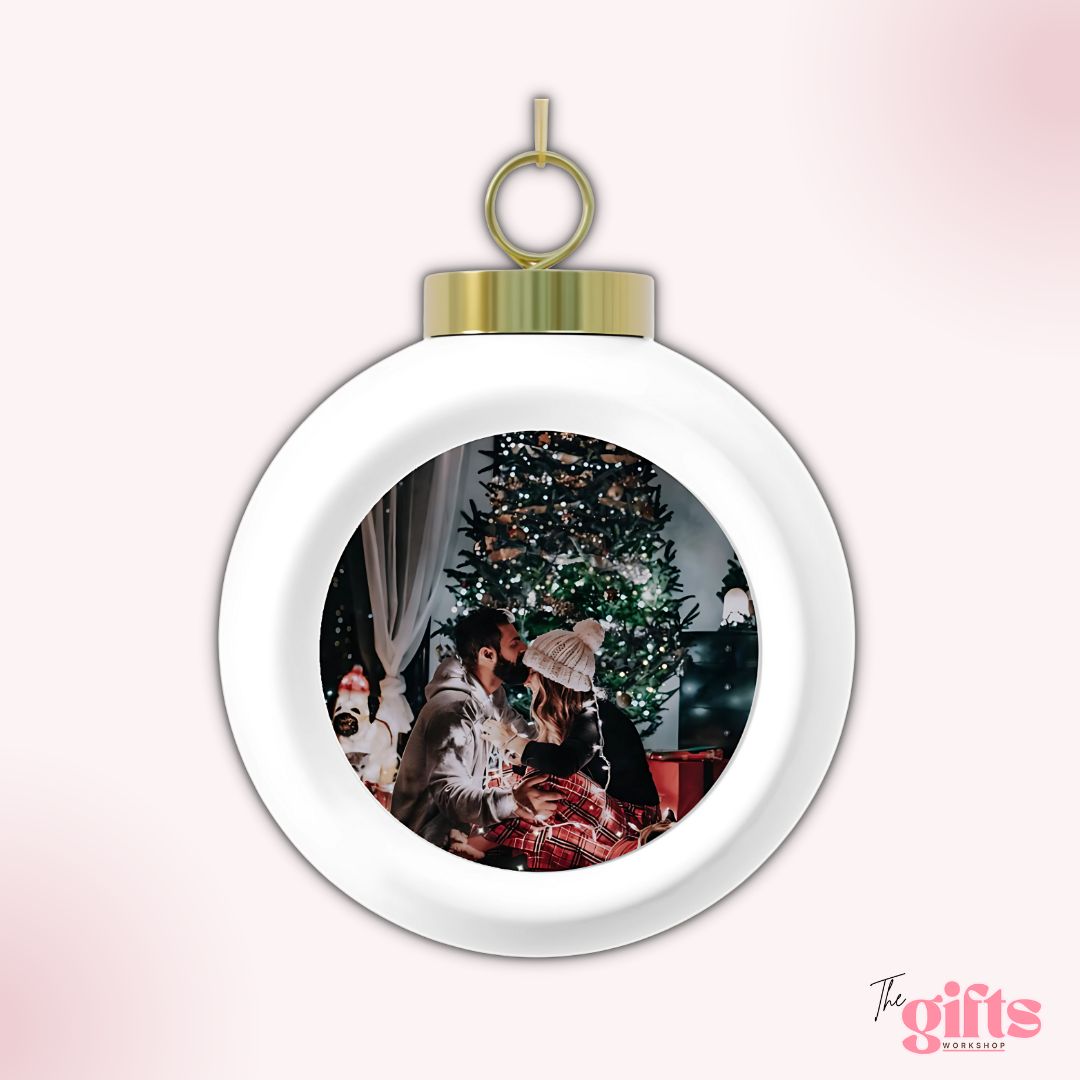 Christmas Photo Baubles a man kissing his wife head
